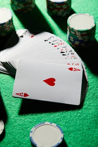 Live dealer spinning American roulette wheel